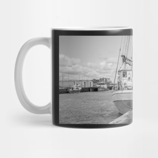 Sailing boat moored in Great Yarmouth harbour Mug